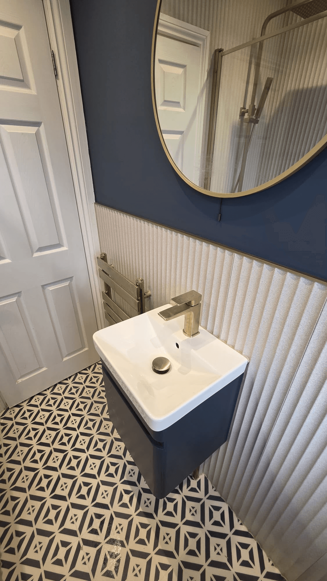 Modern bathroom with patterned floor tiles