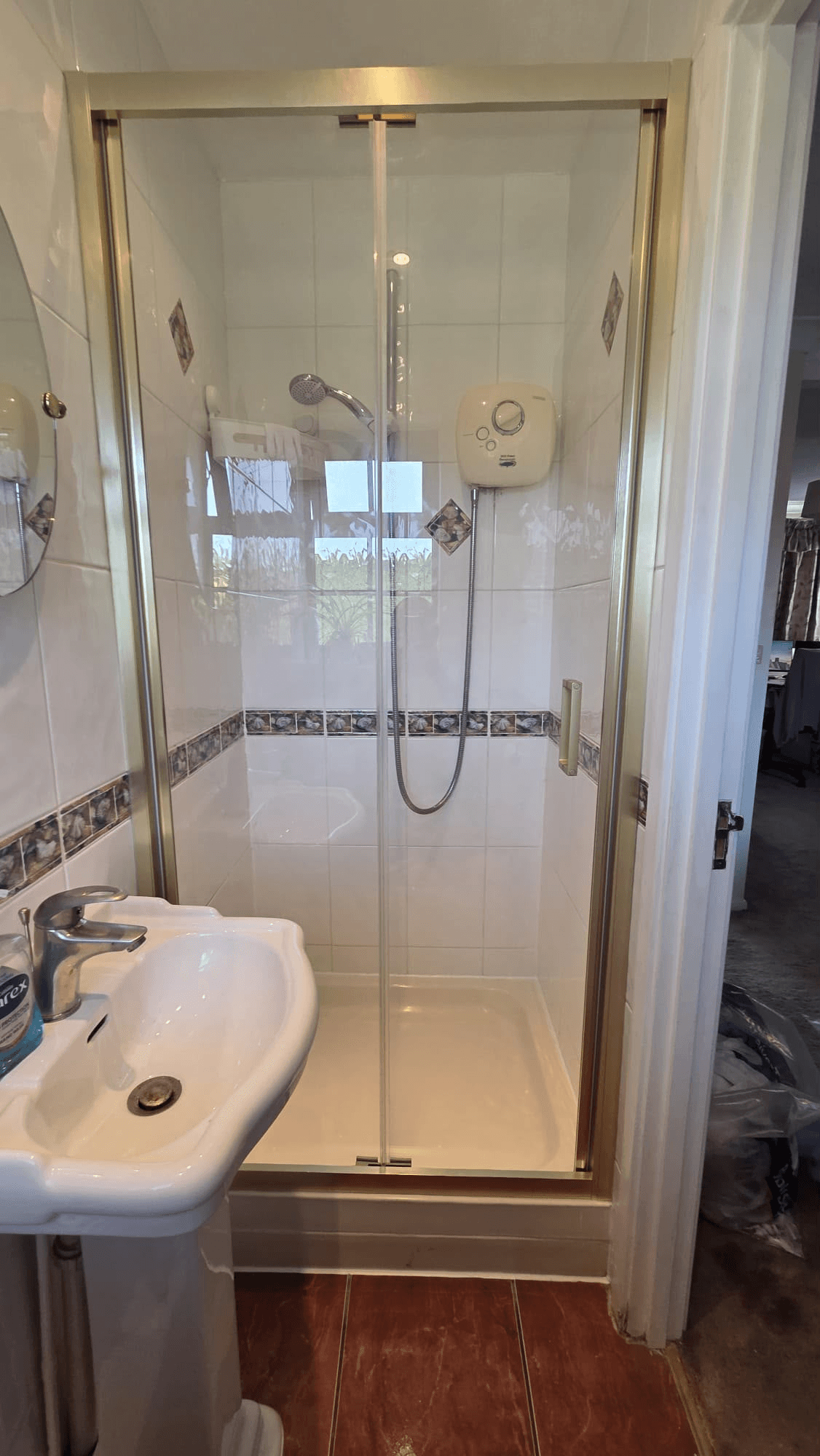 Shower enclosure installation