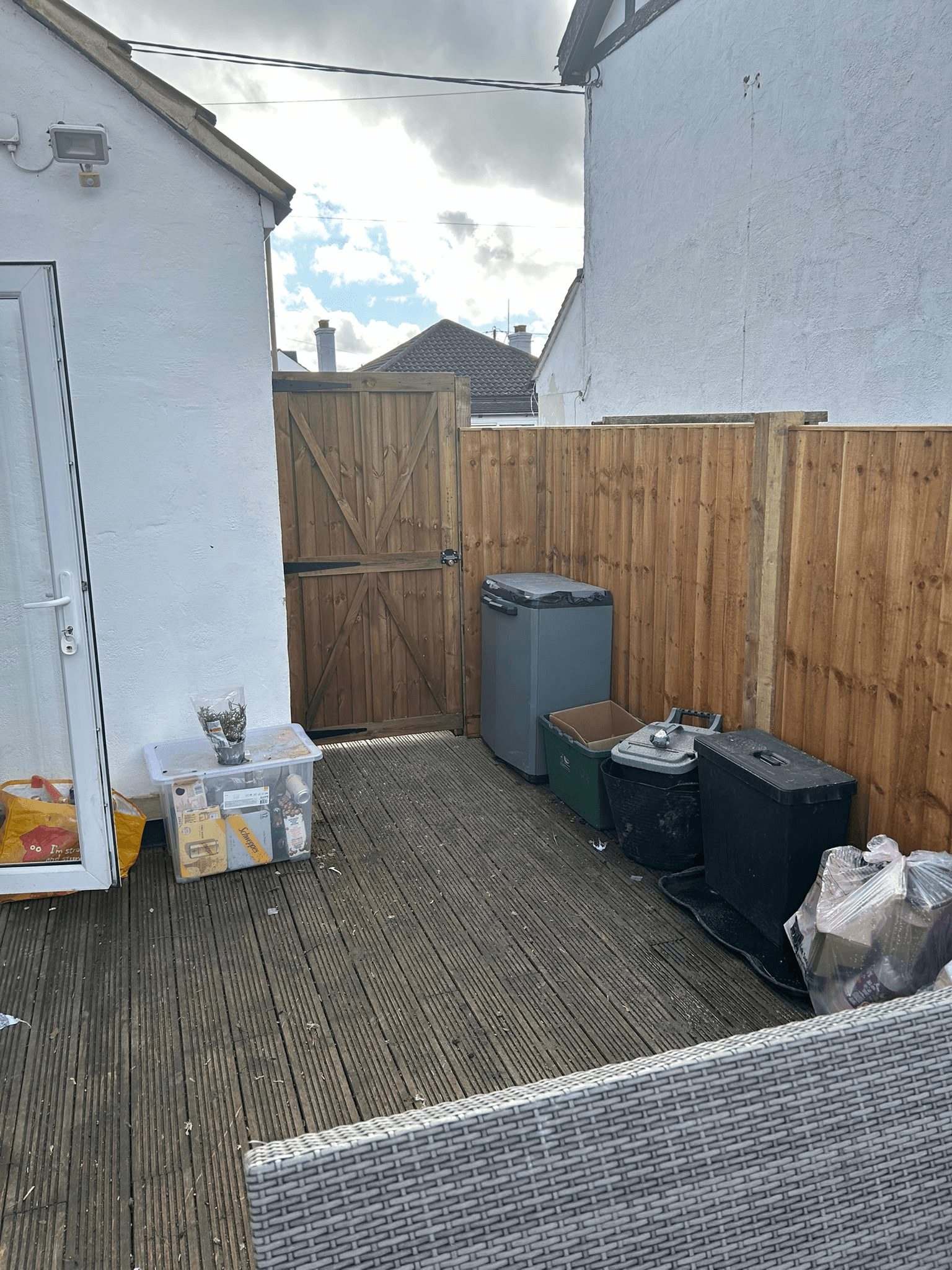 Garden decking area with new timber fence gate